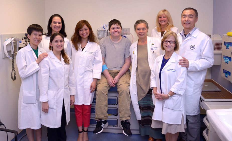 NIAMS team members include (from l) Dr. Yan Huang Dr. Bernadette Marrero Dr. Adriana A. Jesus Dr. Gina Montealegre SAVI patient Elliot Schuman Dr. Raphaela Goldbach-Mansky Patricia O’Brien Dawn Chapelle and Dr. Yin Liu.