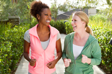 Photo of women walking and talking